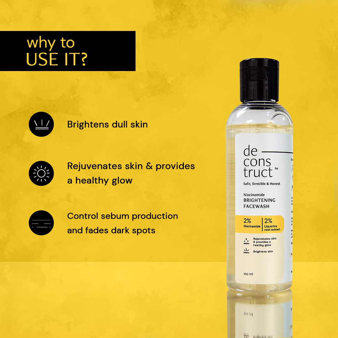 Bottle of deconstruct face wash with benefits listed on a yellow background