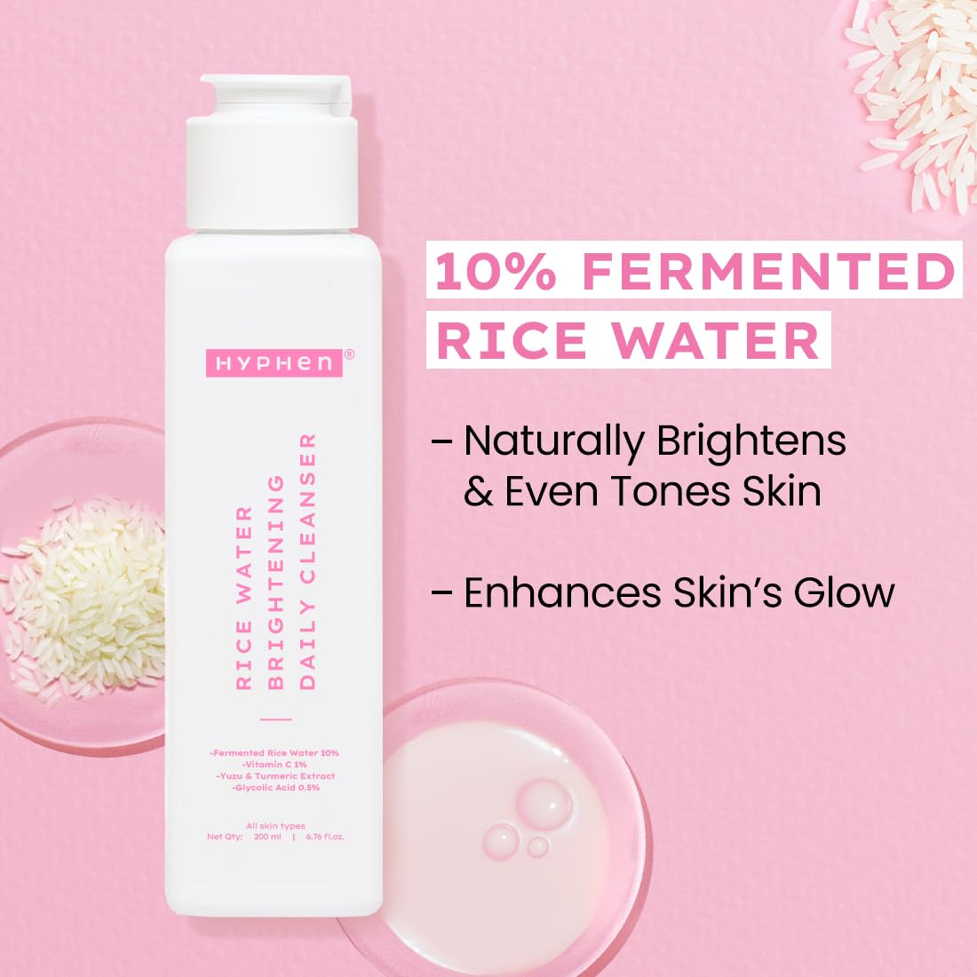 Hyphen rice water cleanser bottle on a pink background with text about its benefits.