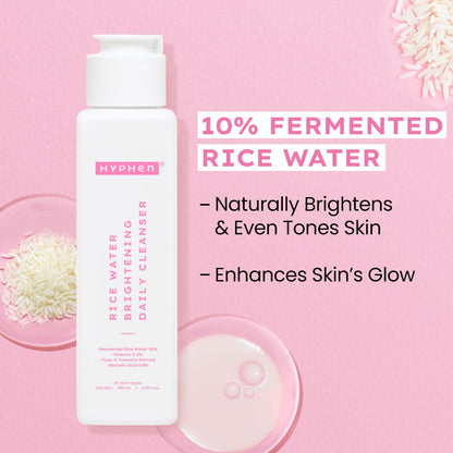 Hyphen rice water cleanser bottle on a pink background with text about its benefits.