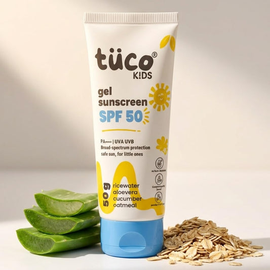 Tube of tüco Kids gel sunscreen SPF 50 with aloe vera and oats on a light background