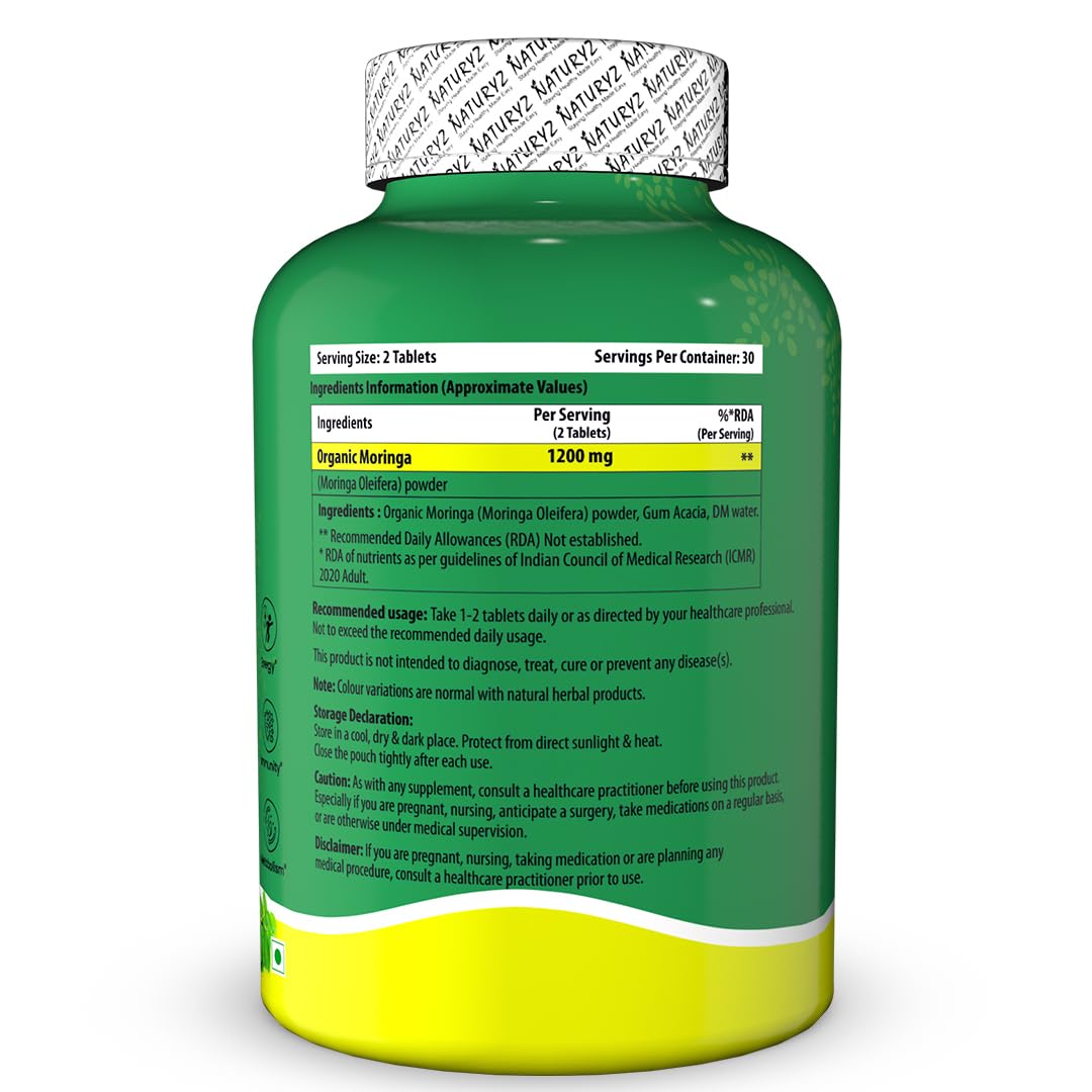 Green supplement bottle with white cap on a white background