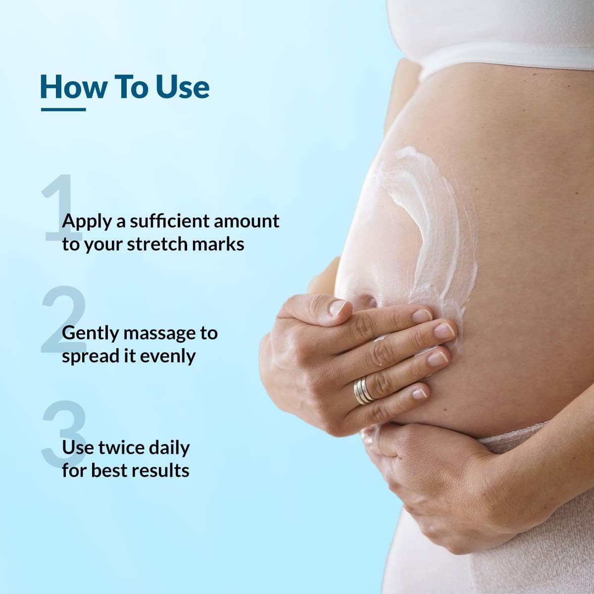 Person applying cream to stretch marks with text on how to use it