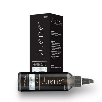 Juene hair oil bottle and packaging on a white background