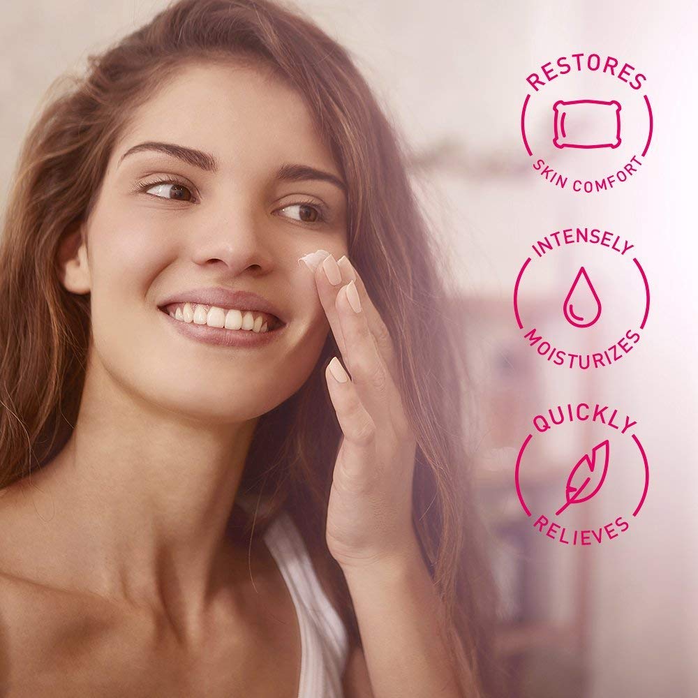 Woman applying cream to her face with product benefits displayed.