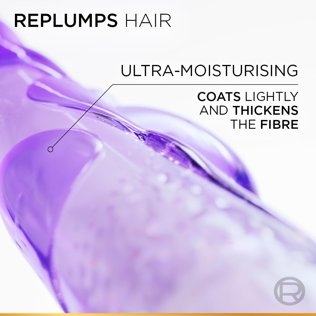 Close-up of a purple hair product with text about ultra-moisturizing properties.