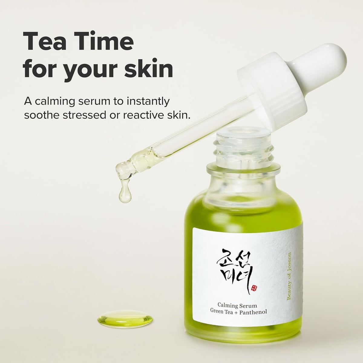 Serum bottle with dropper labeled 'Tea Time for your skin' on a light background