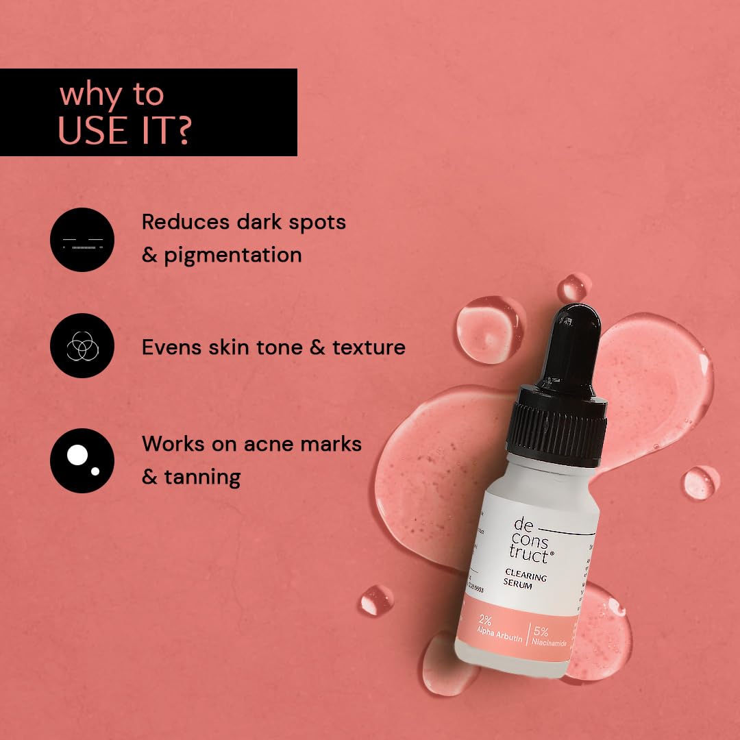 Skincare serum bottle with benefits on a pink background