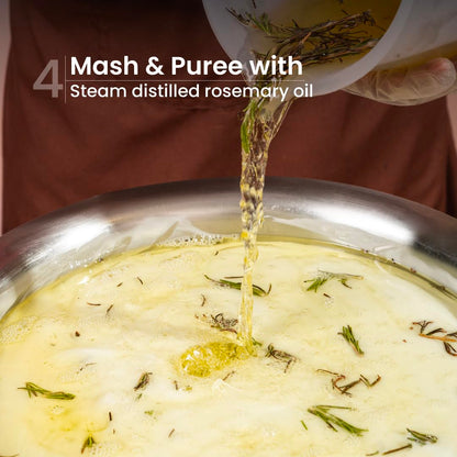 Rosemary oil being poured into a bowl with mashed ingredients