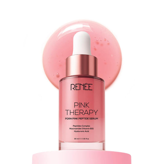 Pink skincare serum bottle with dropper labeled 'RENEE Pink Therapy' on a white background.