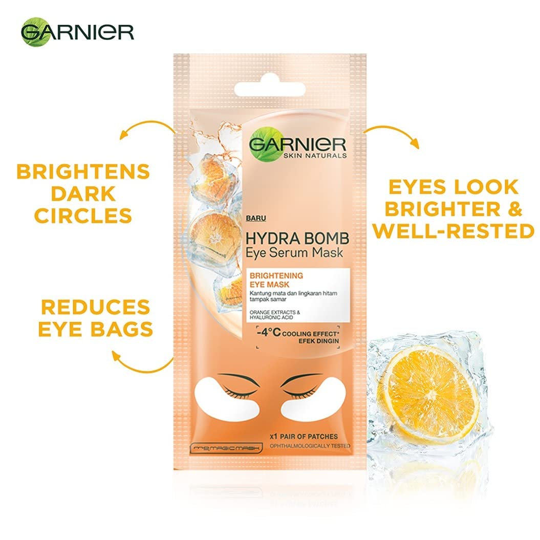 Garnier Hydra Bomb Eye Serum Mask packaging with lemon slices on a white background