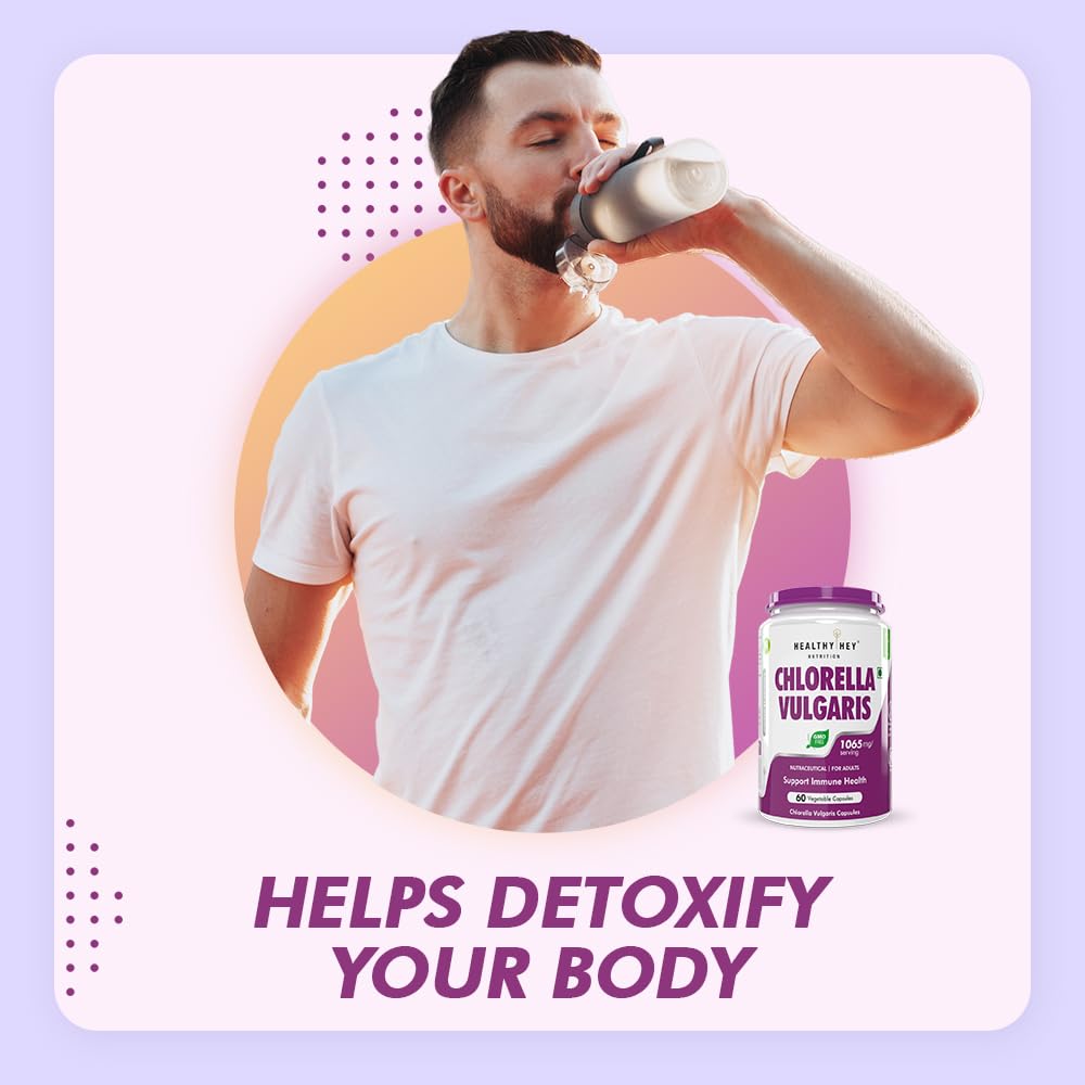 Man drinking from a shaker with Chlorella Vulgaris supplement bottle on a colorful background