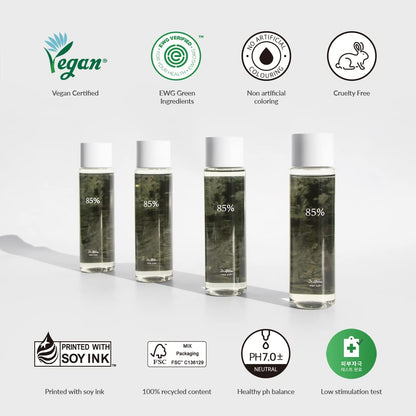 Four bottles of skincare product with certification logos on a white background