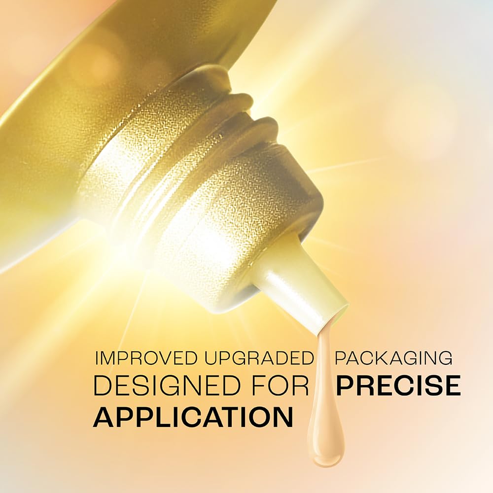 Gold cosmetic bottle with droplet feature on a gradient background