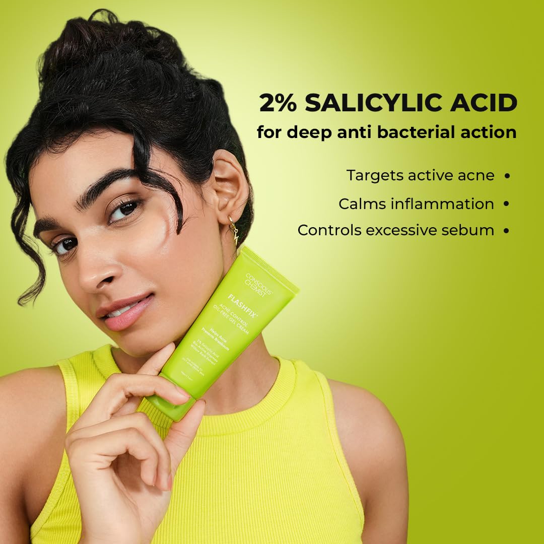 Woman holding a green skincare product with salicylic acid text on a green background