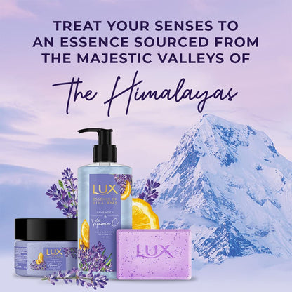 Lux skincare products with lavender and lemon elements against a Himalayan mountain background