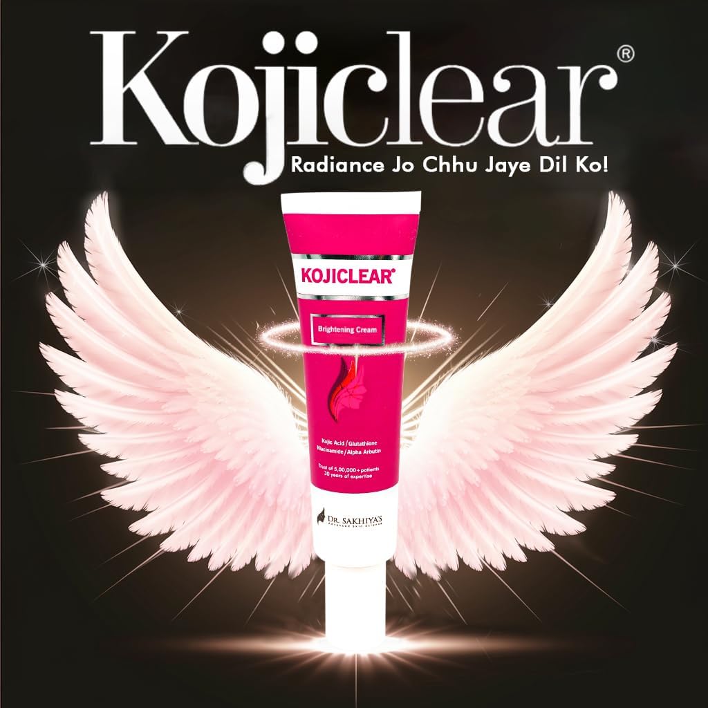 Kojiclear cream tube with pink wings on a dark background