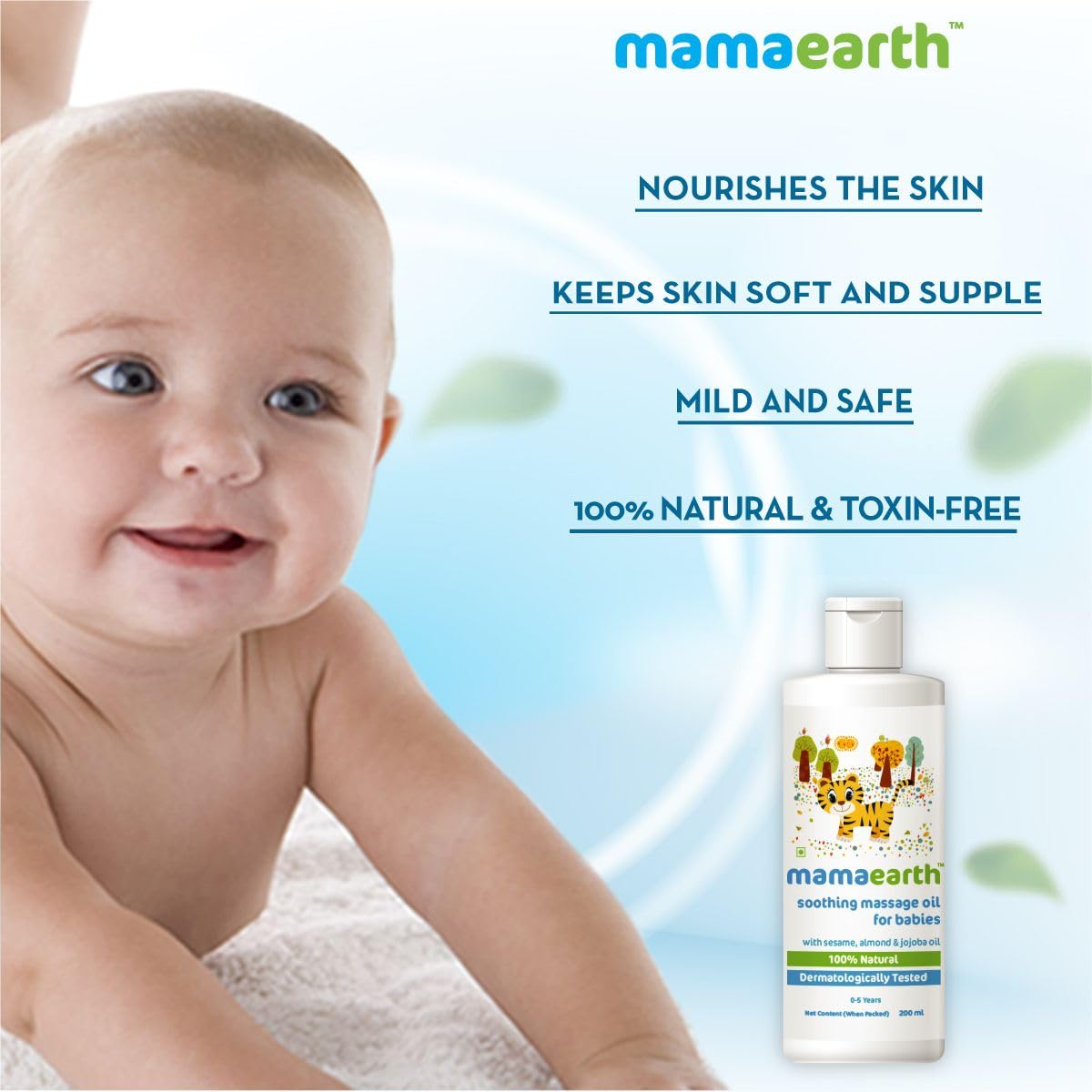 Baby with a bottle of Mamaearth baby oil against a light blue background