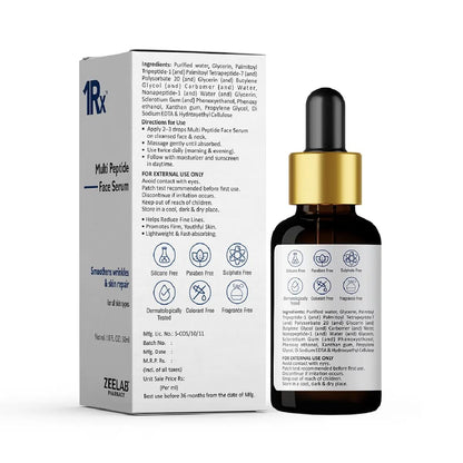 Facial serum bottle with dropper and packaging on a white background