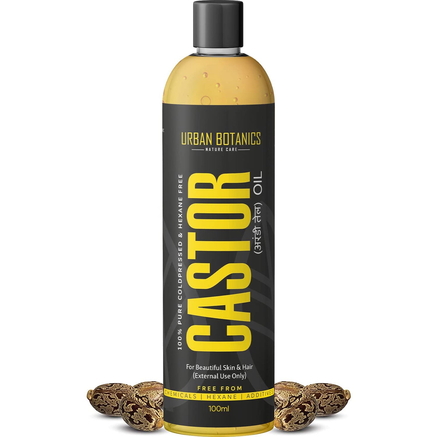 Bottle of Urban Botanics Castor oil with a black and yellow label on a white background.