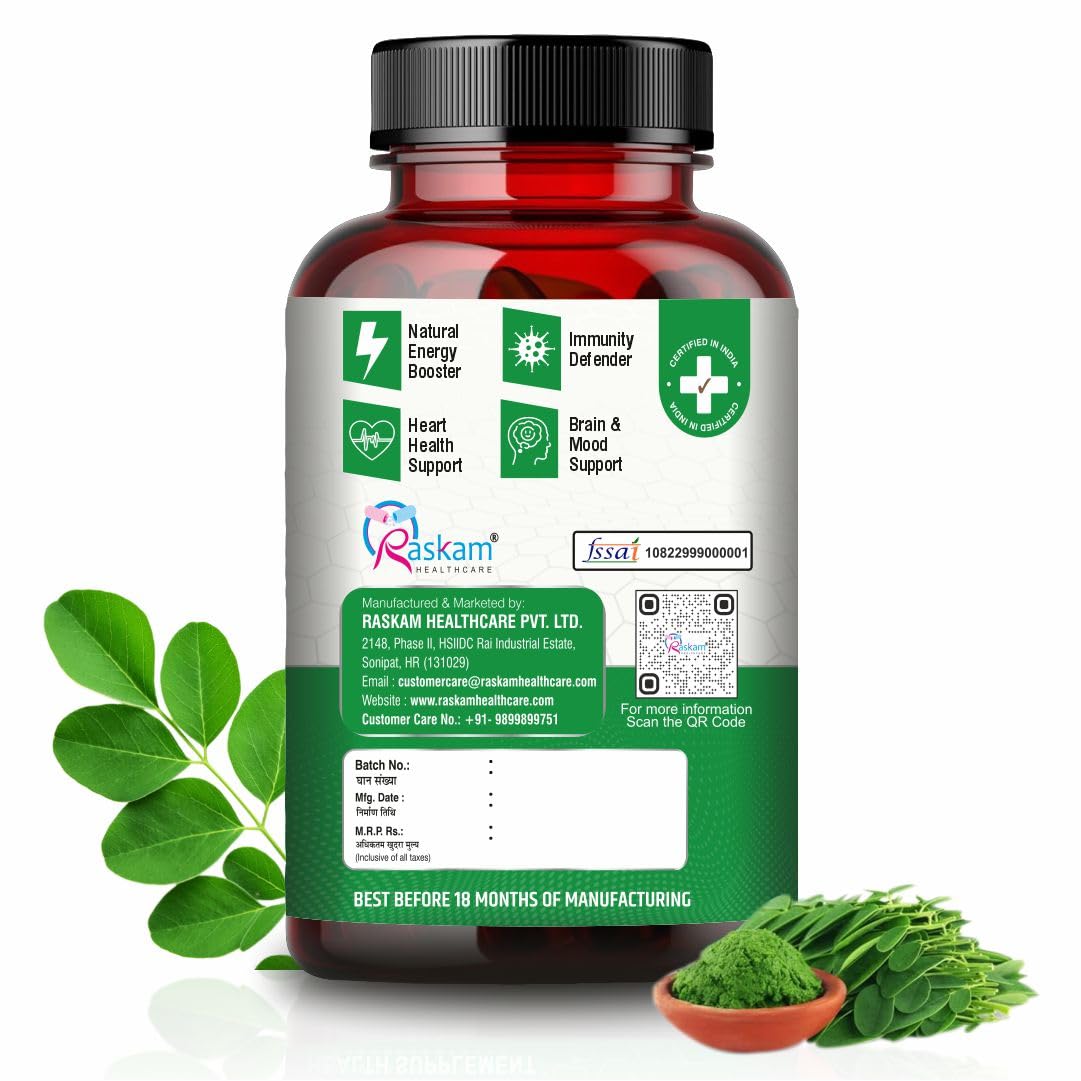 Bottle of Raskam supplement with green leaves on a white background