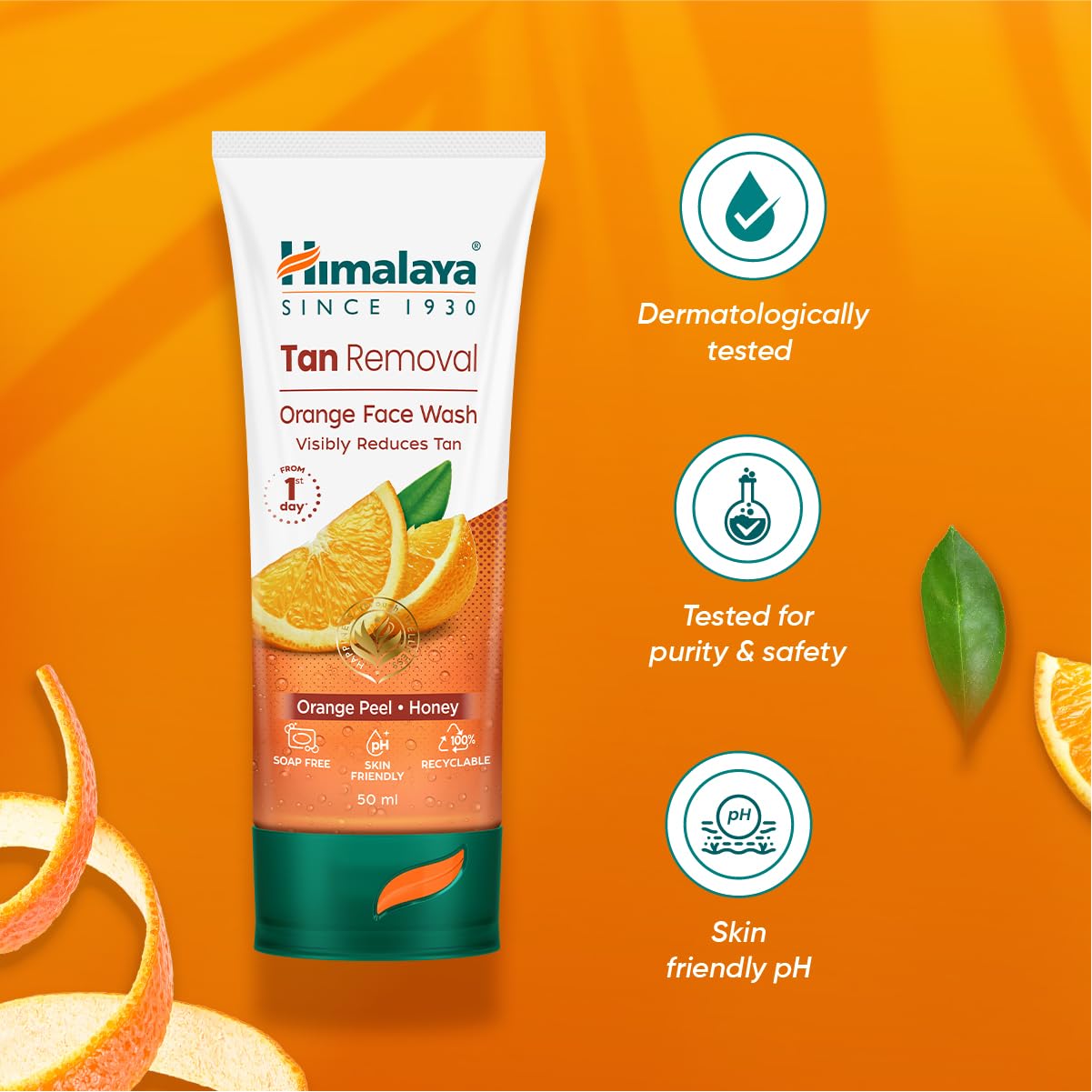 Himalaya Tan Removal Orange Face Wash tube on an orange background with product features displayed.