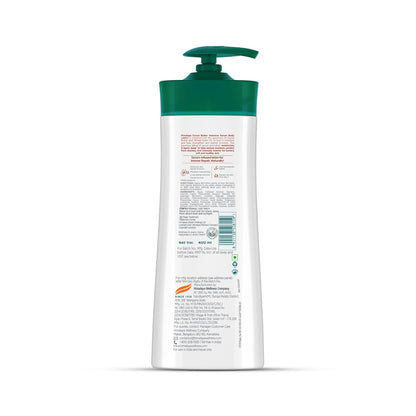 Lotion bottle with green cap on a white background