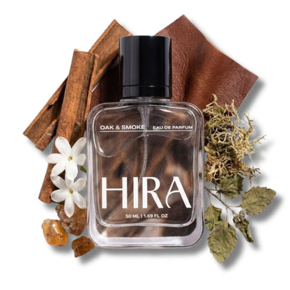HIRA perfume bottle with natural elements on a white background
