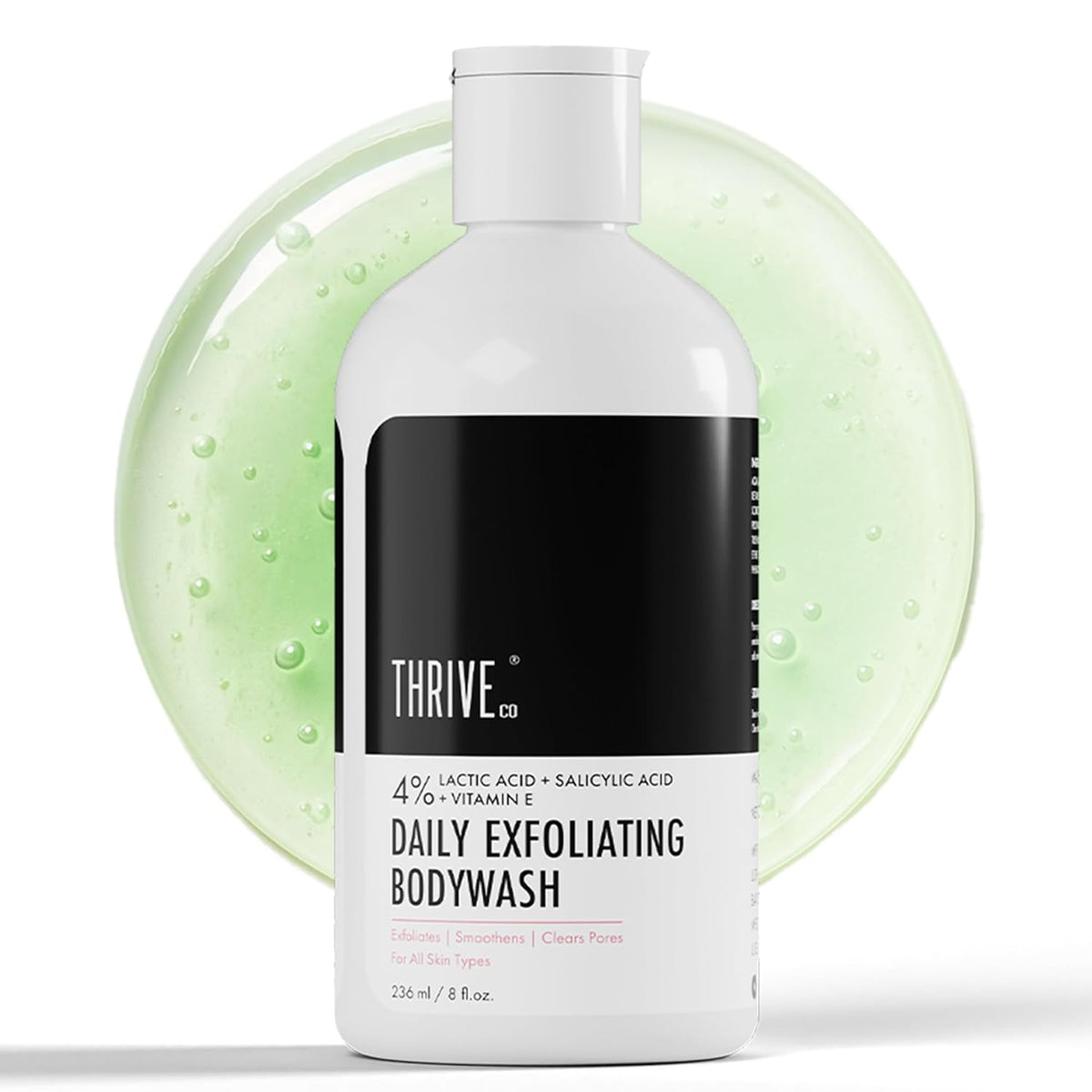 Bottle of Thrive Daily Exfoliating Bodywash with a green gel sample on a white background