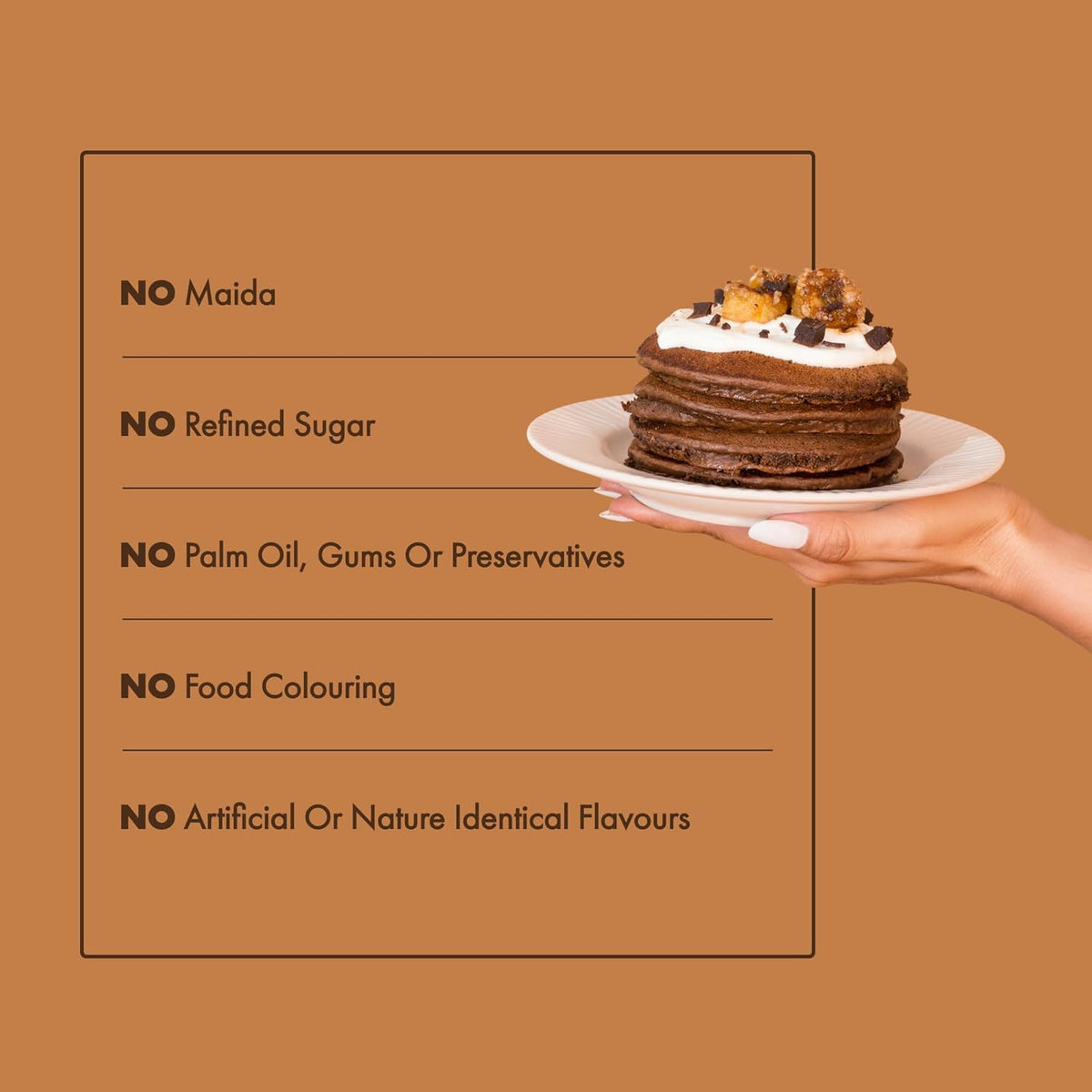 Hand holding a plate with a chocolate cake against a brown background with text about ingredient claims.