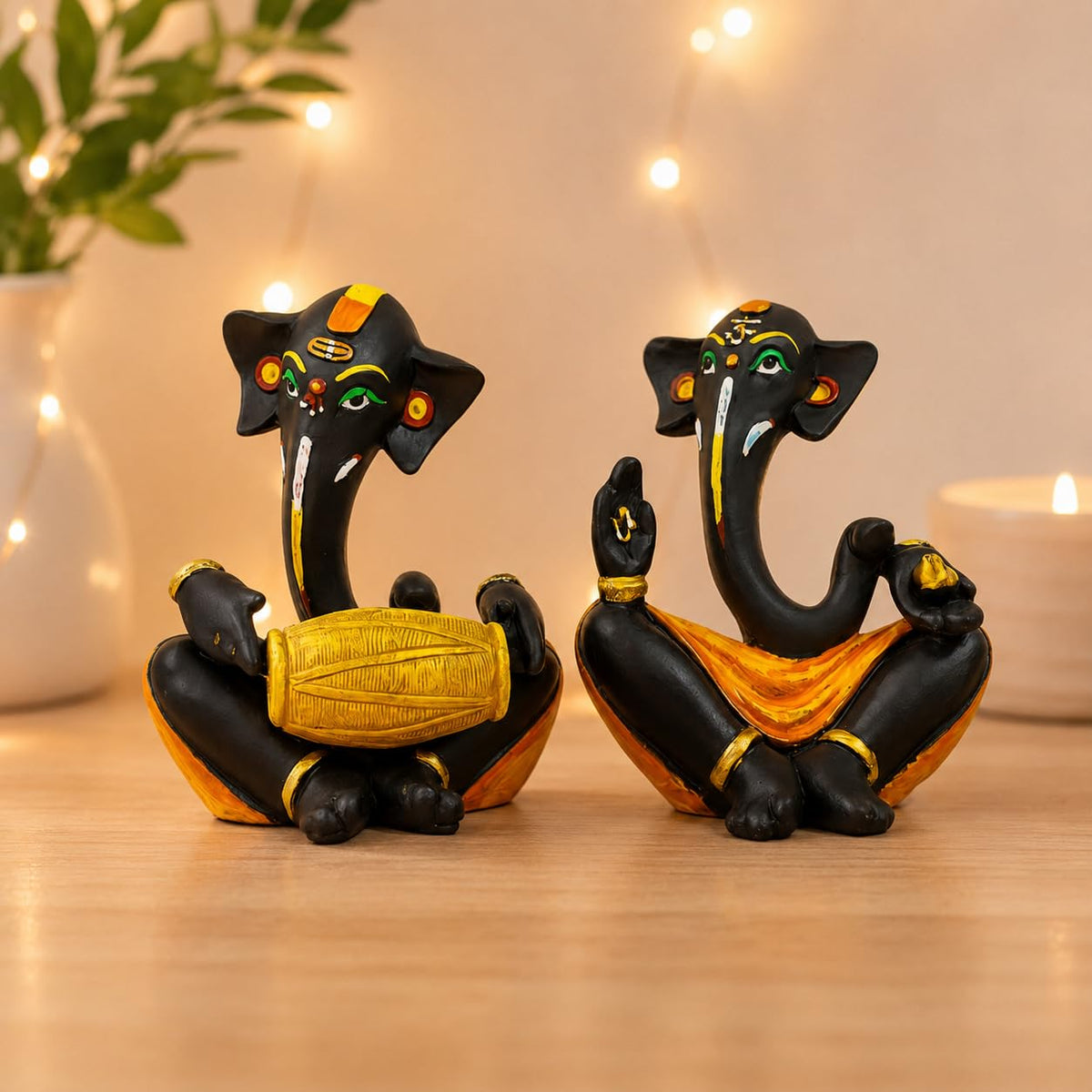 Beautiful Resin hawa Ganesha Statues for Home Decor (Pack of 2, Black & Yellow Colour)