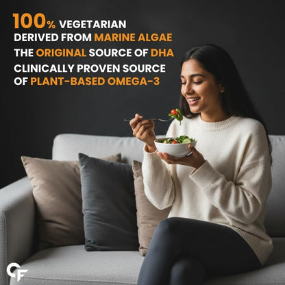 Woman sitting on a couch holding a bowl of salad with text about vegetarian food source.