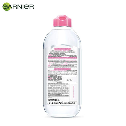 Garnier shampoo bottle with pink cap on a white background