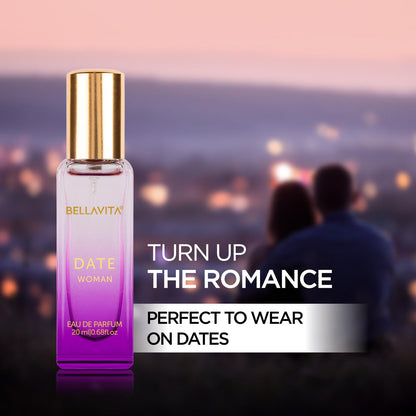 Perfume bottle with text 'Turn up the romance' against a blurred cityscape background