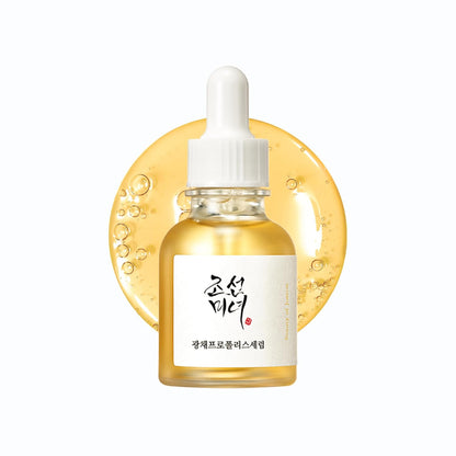 Skincare serum bottle with dropper on a white background