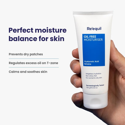Hand holding a tube of Re'equil Oil Free Moisturizer with product details on a white background