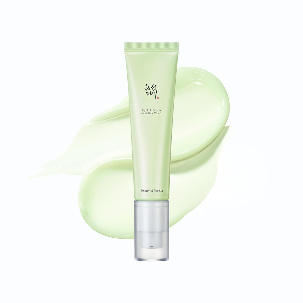Skincare product with a green tube and bottle on a white background