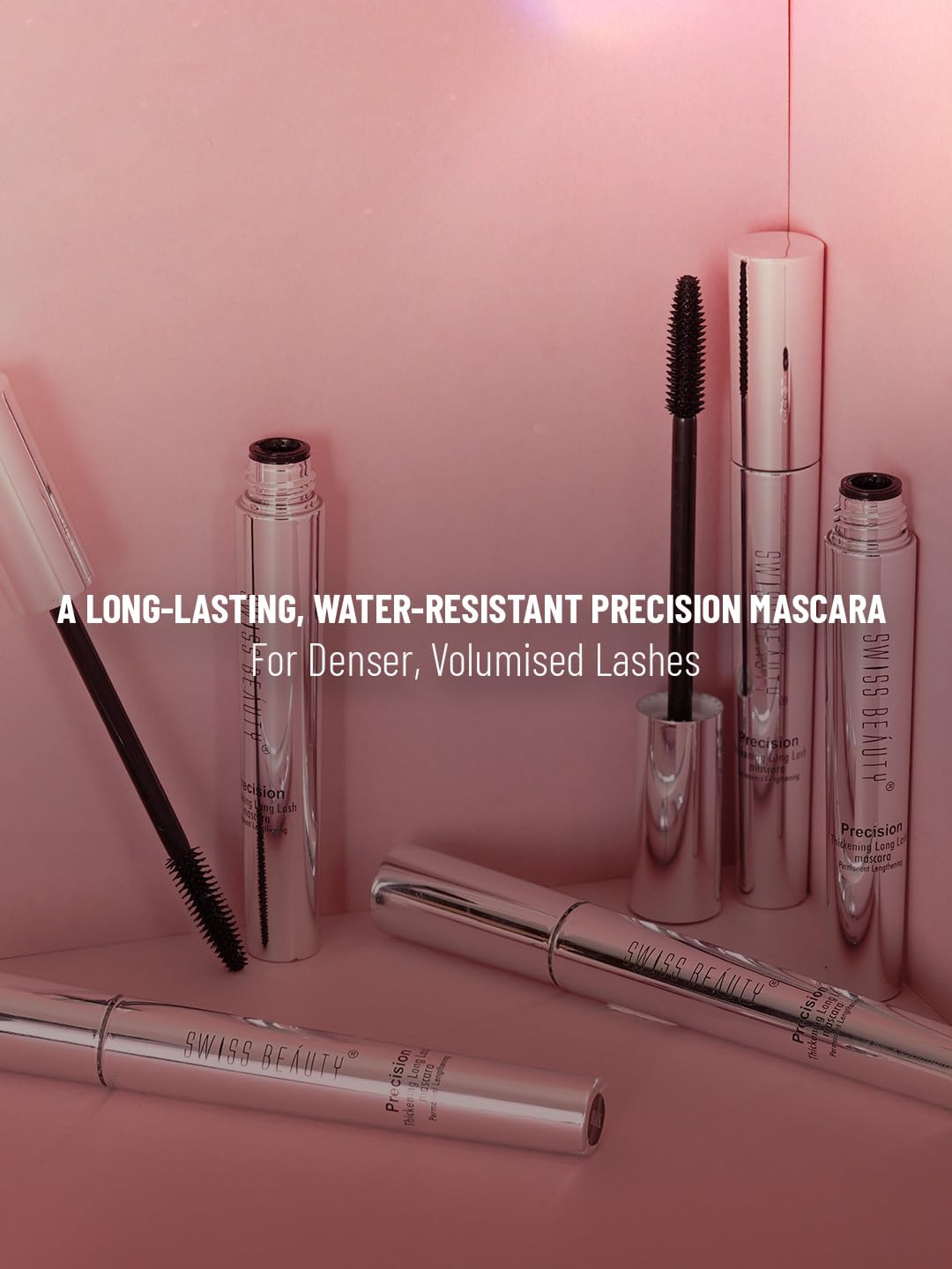 Mascara products on a pink background with text about long-lasting, water-resistant precision mascara.