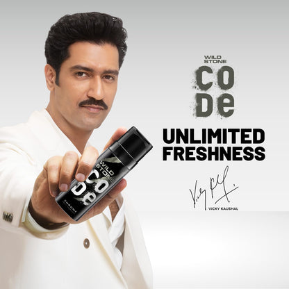 Man holding a Wild Stone product with 'Code Unlimited Freshness' text and Vicky Kaushal's signature.
