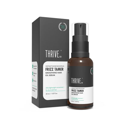 Thrive Co. Frizz Tamer Smoothing Hair Oil Serum bottle and packaging on a white background