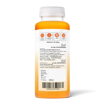 Orange bottle with white label on a white background