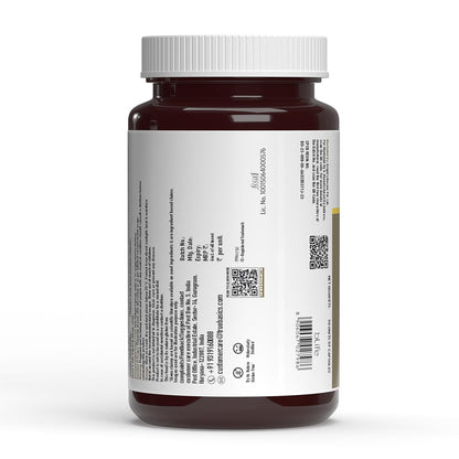 Brown supplement bottle with white label on a white background