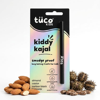 Tüsco Kids Kiddy Kajal packaging with almond and castor seeds on a white background