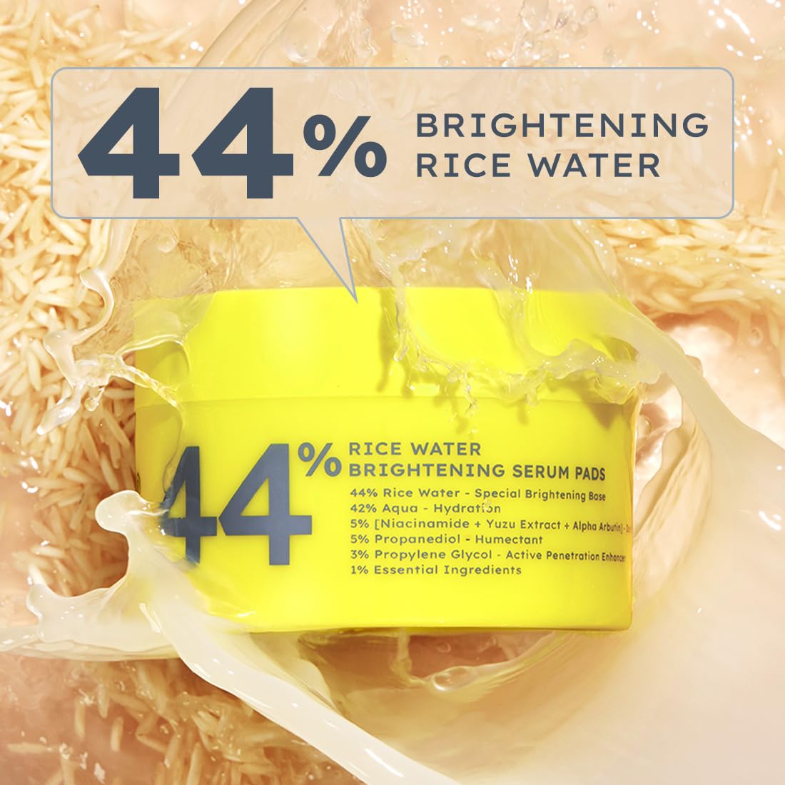 Yellow container of 44% Rice Water Brightening Serum Pads with rice straw background