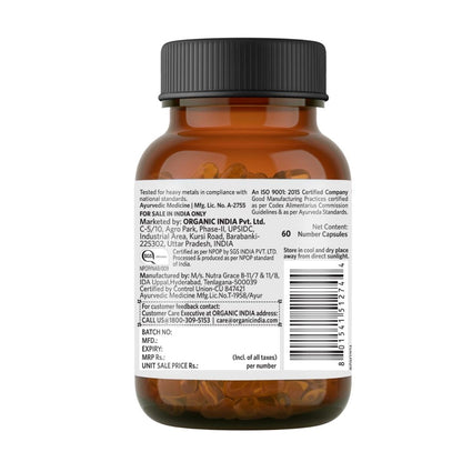 Brown supplement bottle with label on a white background