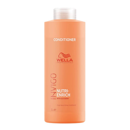 Orange conditioner bottle with Wella logo on a white background