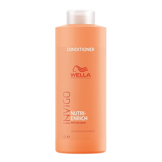Orange conditioner bottle with Wella logo on a white background