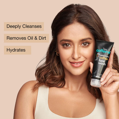 Woman holding a coffee face wash with product features listed on a beige background