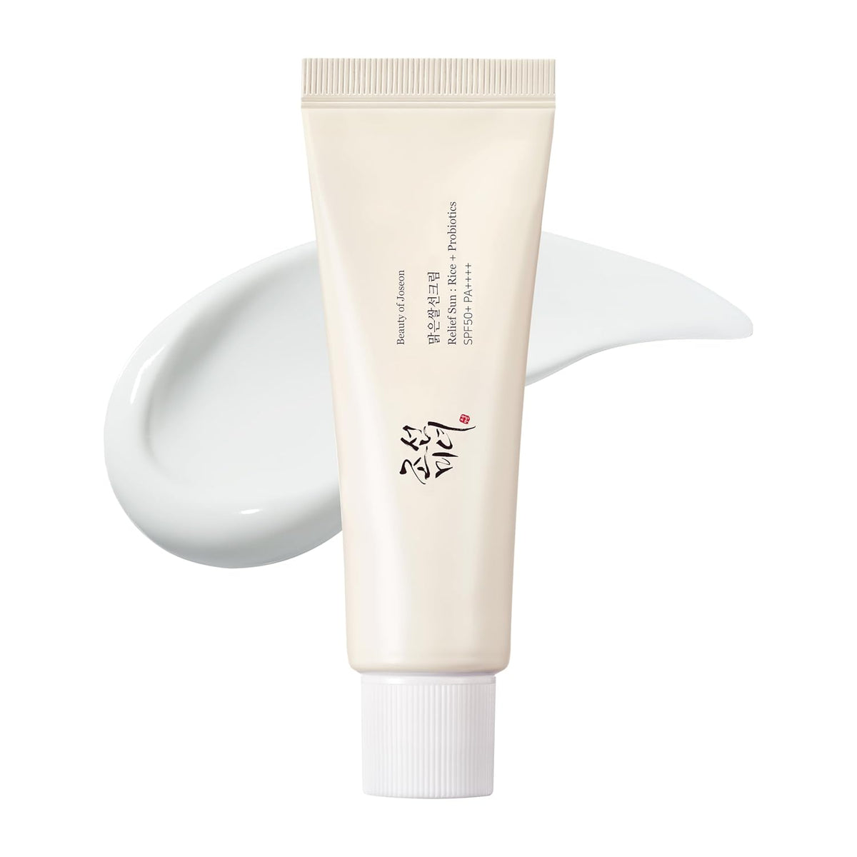 Tube of skincare product with white cream on a white background