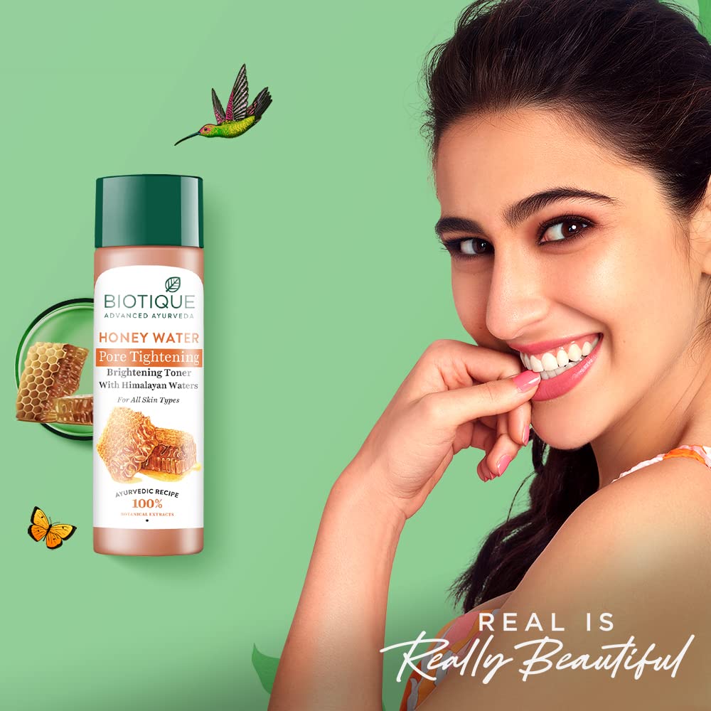 Biotique Honey Water product with a woman smiling on a green background