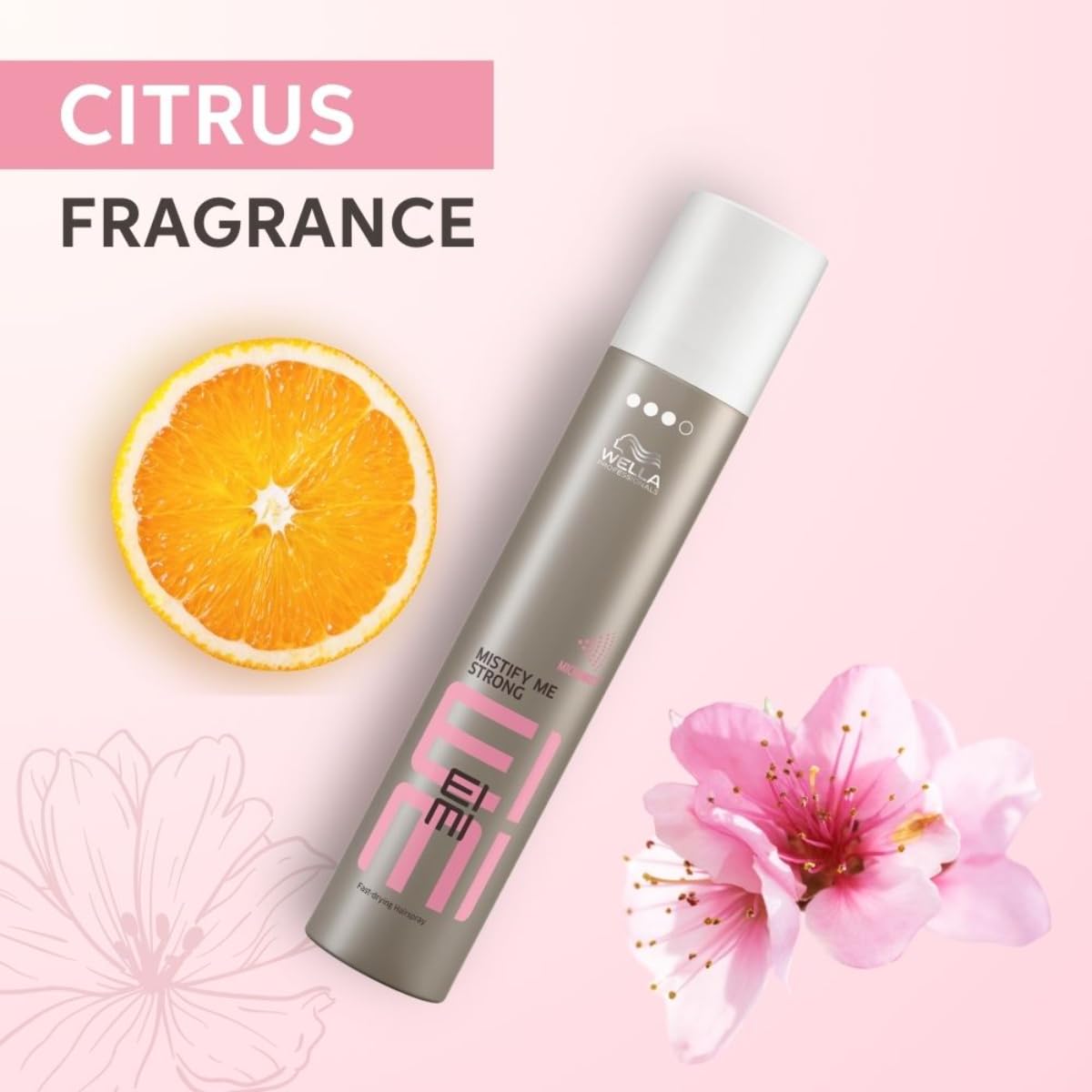 Wella EIMI hair product with citrus fragrance on a pink background with orange and flower.
